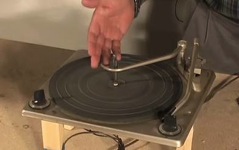 An experiment using a turntable to test nail finishes.